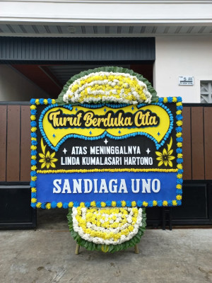 Papan Bunga Duka di Mario