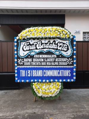 Papan Bunga Duka di Mario